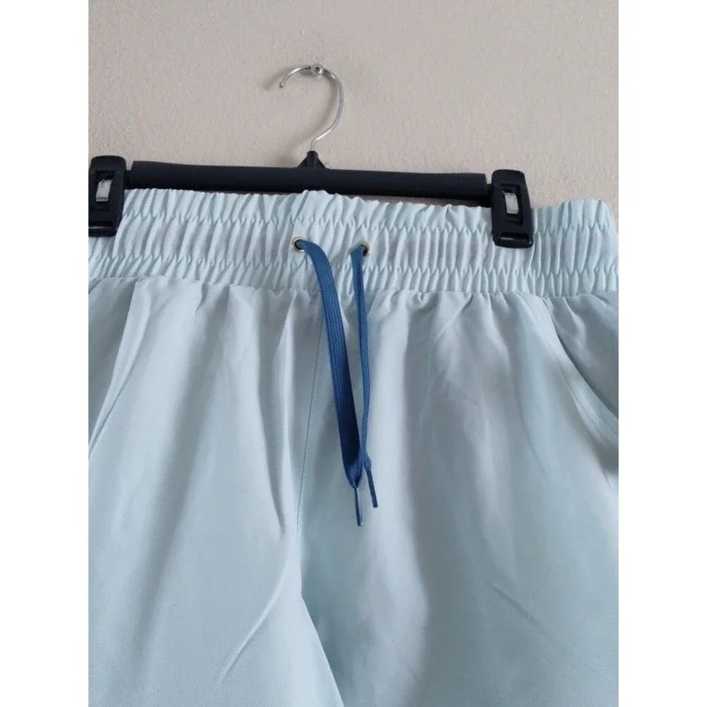 New with tags Women's Reebok Gym Workout Athletic Light Blue Shorts Size L / G